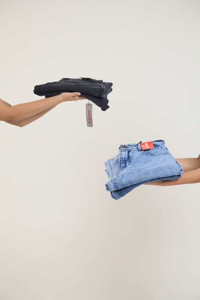 Lynx acid-wash and dark denim folded still life, luxury comfort